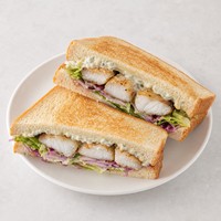 Grilled Fish, Salad and Tartar Sauce Sandwich