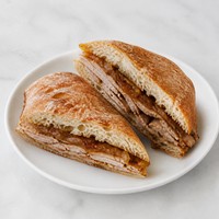 Roast Pork and Caramelized Onion Sandwich